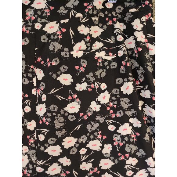 Izod Golf Skort Sz 10 Black Floral Mini Skirt Built-In Shorts Pockets Stretch - Picture 9 of 9